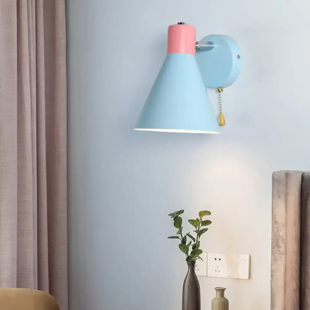 Contemporary blue and pink metal conical wall sconce with matte finish direct wired and pull chain for bedroom lighting