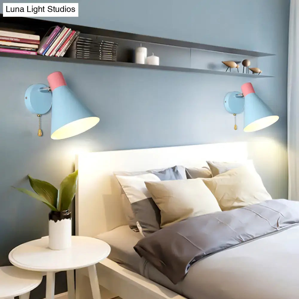 Contemporary blue metal direct wired bedroom sconce with pink accents matte finish adjustable arms e26 e27 pull chain