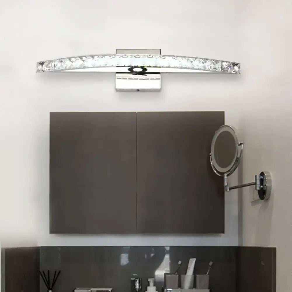 Contemporary bow shaped silver vanity lighting wall sconce with sleek chrome finish and embedded crystal accents