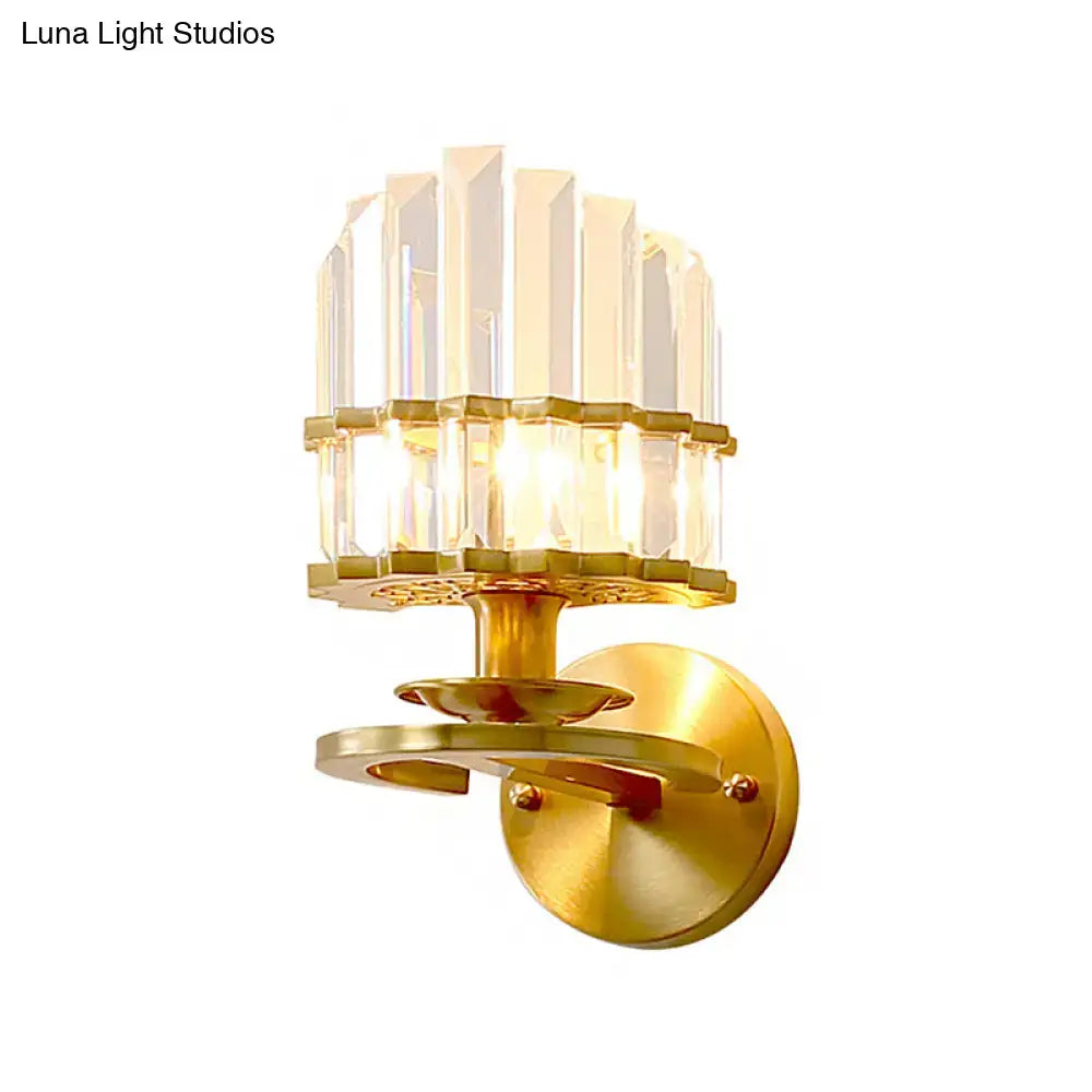 Contemporary gold-toned wall lamp with clear crystal tiered prisms ideal for e12 e14 bedroom sconce lighting