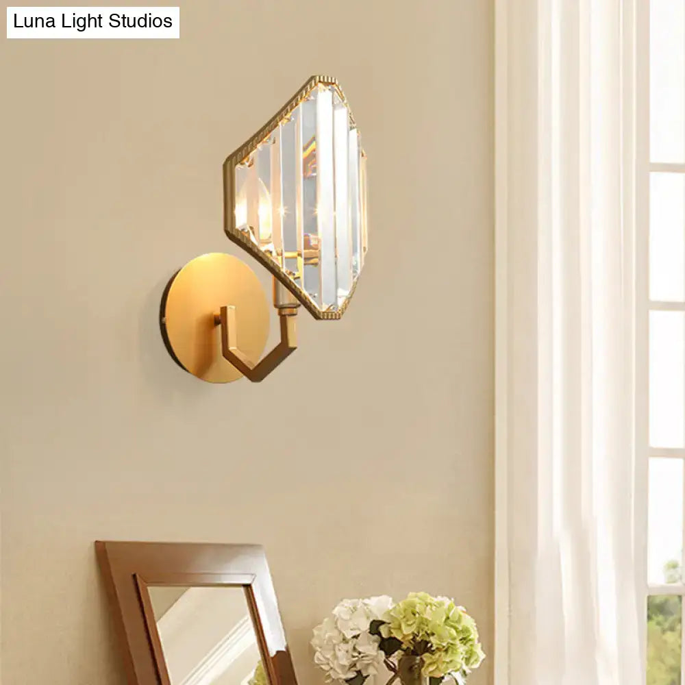 Contemporary brass rhombus wall sconce with gold tone and clear crystal prism for bedroom lighting