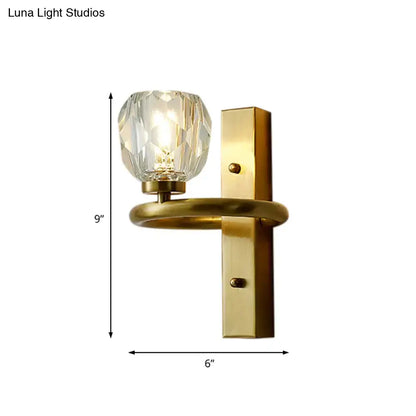 Contemporary brass wall sconce with a faceted global crystal shade for dining room use 220v-240v 110v-120v compatible