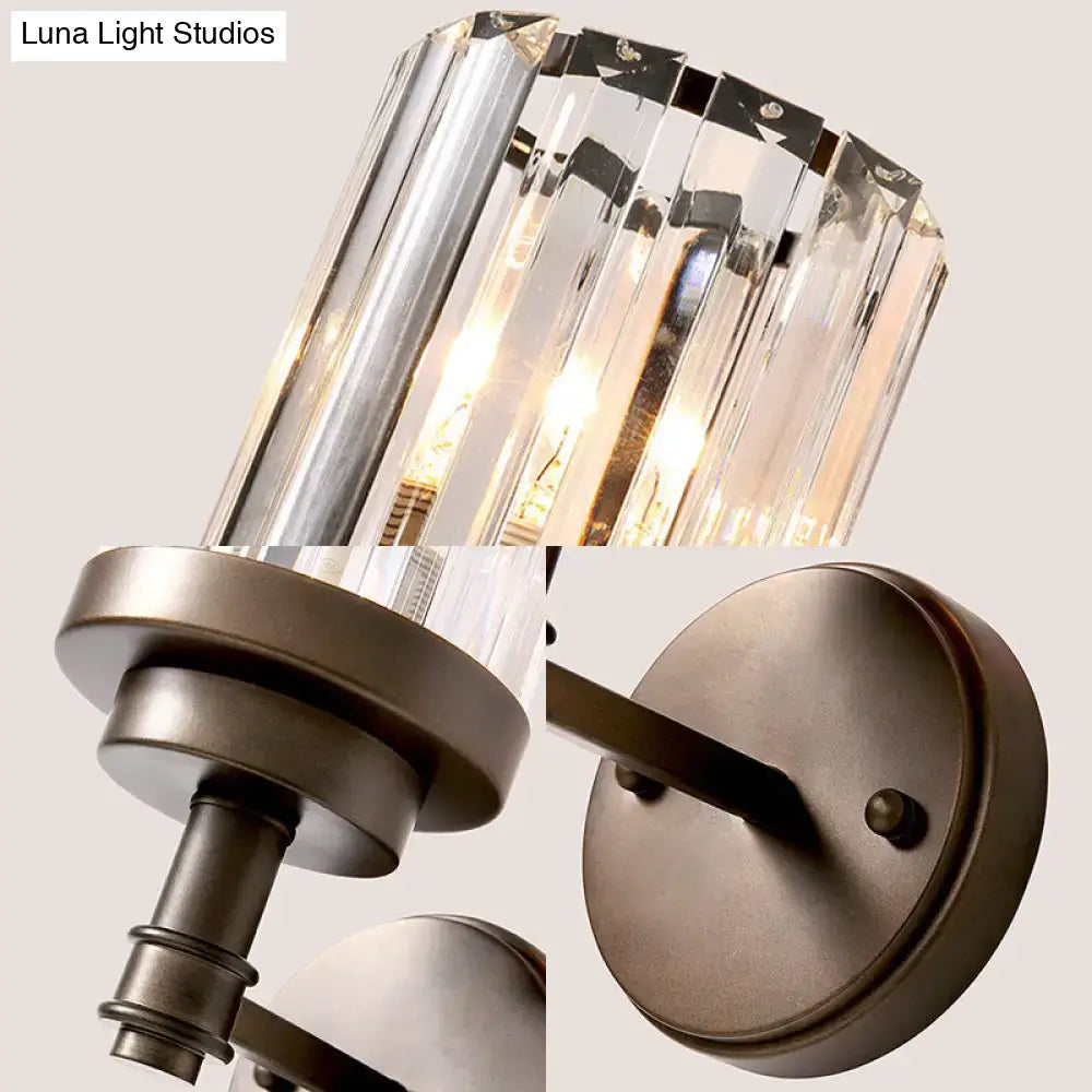Contemporary bronze wall sconce with clear crystal prism ribbed crystal shade and dark bronze metal base light fixture