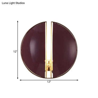 Contemporary burgundy and gold wall lamp with glossy finish and integrated light source for bedroom use