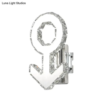 Contemporary chrome anchor wall lamp with crystal accents and warm white light featuring sleek fixture height design