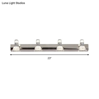 Contemporary chrome conic sconce light with four clear textured glass shades for bathroom vanity lighting