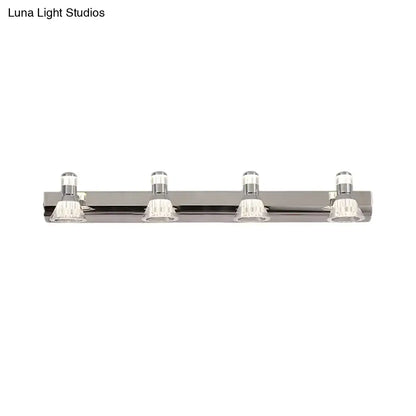 Contemporary style conic sconce light with chrome finish and four clear glass shades for bathroom vanity lighting