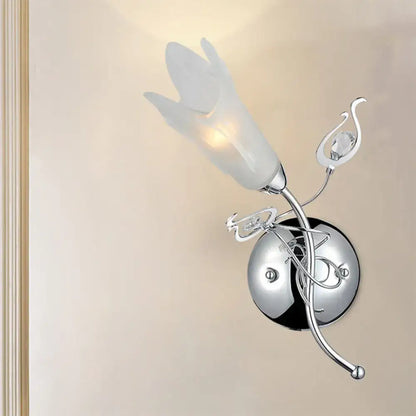 Contemporary chrome opal glass petal wall sconce with frosted tulip shade and e12 light for bedroom lighting