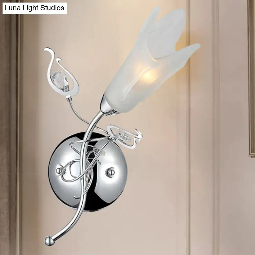 Contemporary chrome e12 wall sconce with frosted opal glass tulip shade and crystal accents for bedroom lighting