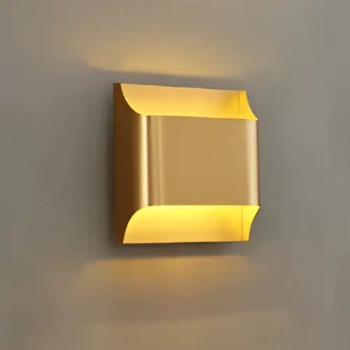 Gold-colored contemporary copper brass wall sconce by decorbites with a sleek modern design for living room decor