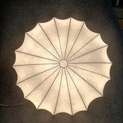 Beige fan-shaped paper lantern with textured surface as a contemporary cream petal led ceiling light for dining room