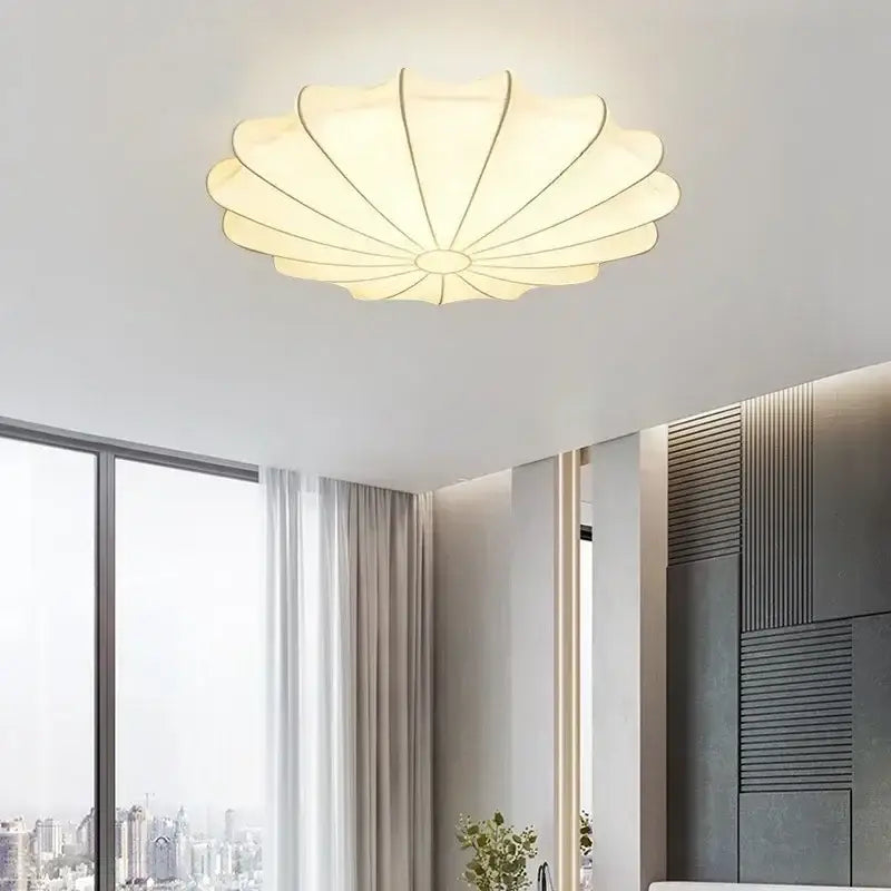 Contemporary cream petal led ceiling light with soft diffused glow and metallic accents for dining room use
