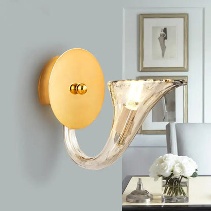 Contemporary gold wall lamp with curved translucent glass horn shade and circular backplate for 220v-240v use