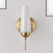 Contemporary gold and opal conical wall sconce with gold-toned metal and white tapered glass shade for bedroom lighting