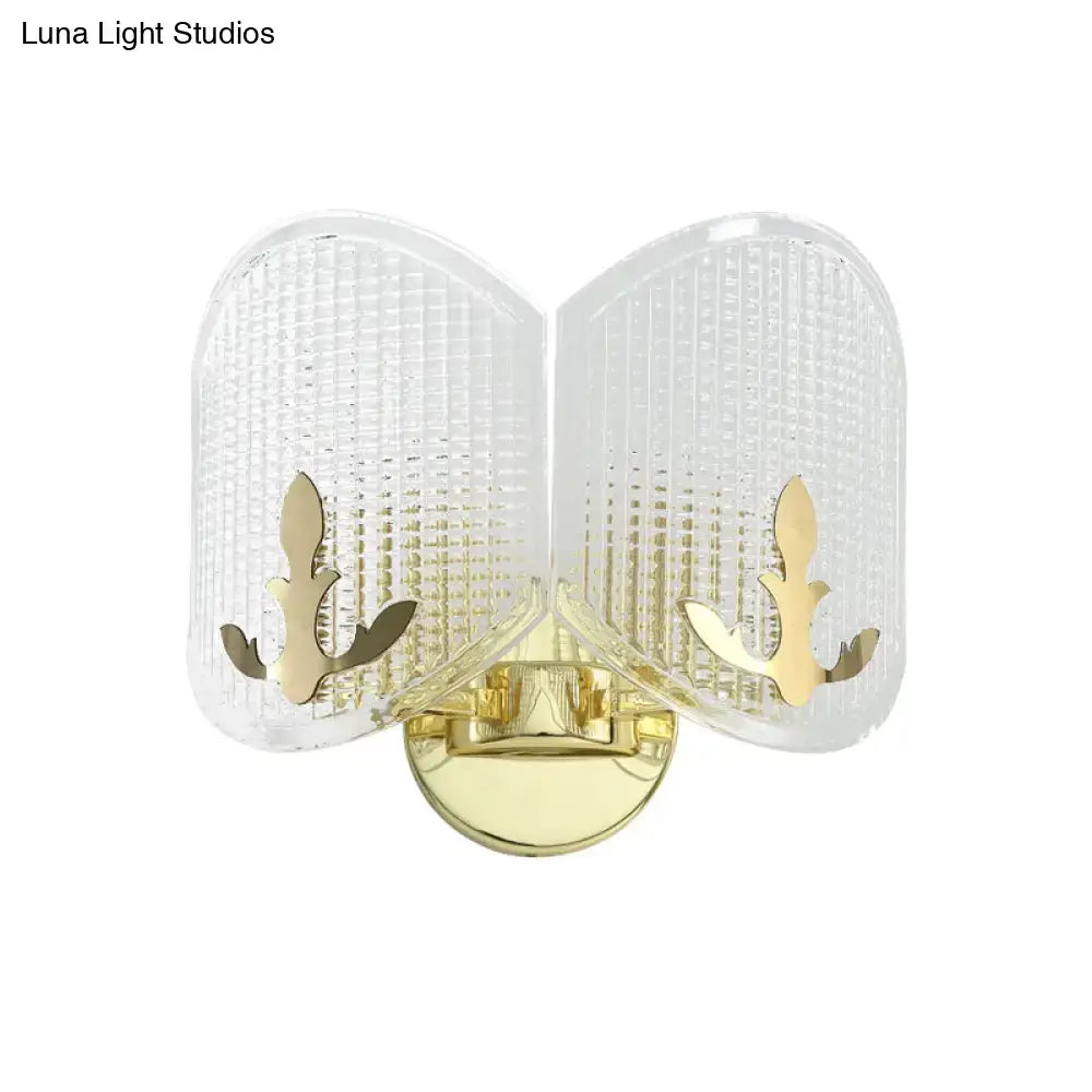 Contemporary gold arc light fixture wall sconce with gold-finished metal and textured glass shades for living room