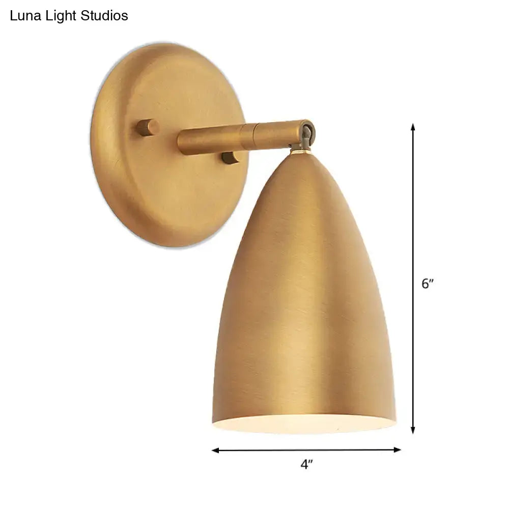 Contemporary brass-finished wall mount lamp with a sleek gold conical shade and circular mounting plate for bedroom spotlight