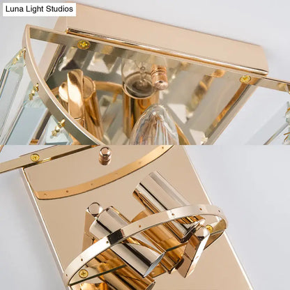 Contemporary gold crystal block wall lamp with mirrored glass panels and sleek metallic accents for dining room lighting