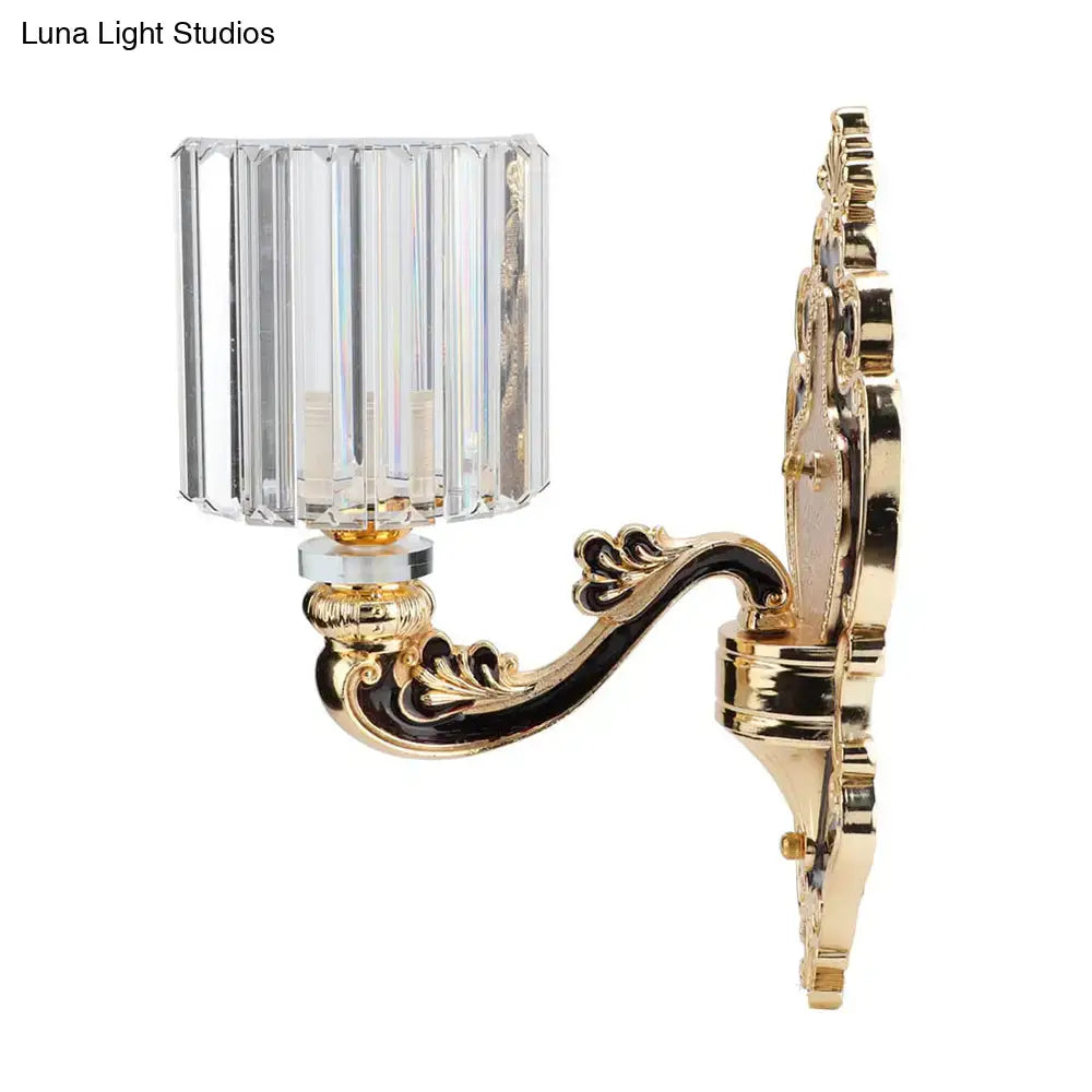 Contemporary gold crystal cylinder wall sconce fixture with faceted shade and ornate black detailing for bedroom e26 e27 bulb