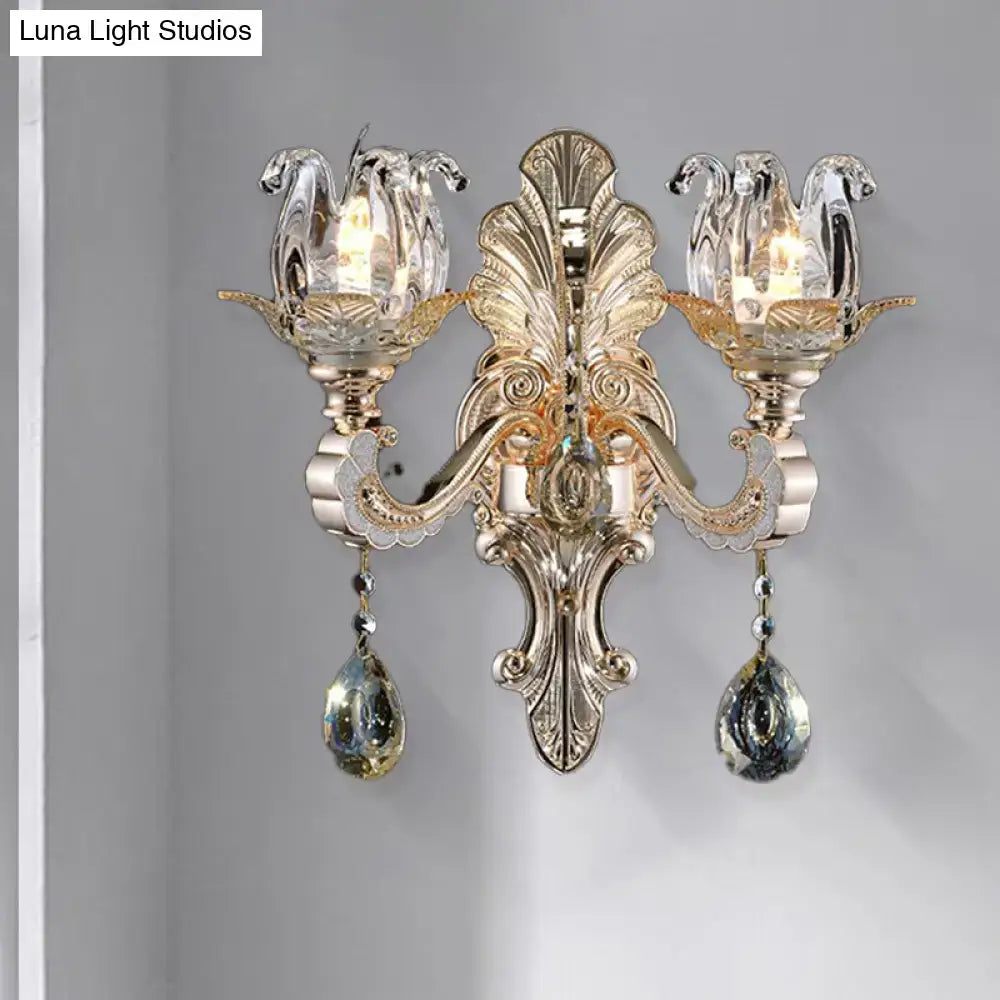 Ornate gold-toned contemporary wall lamp with crystal drop swan-shaped shades and teardrop crystals light fixture