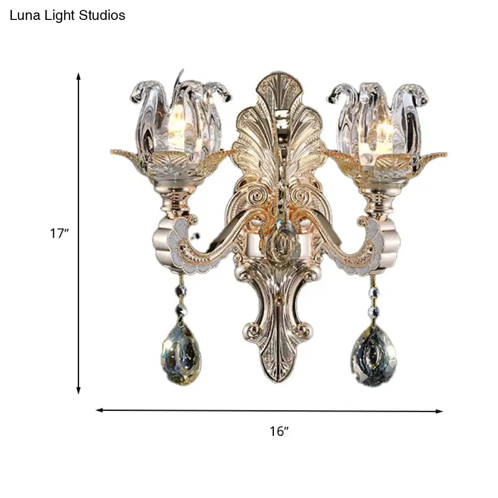 Ornate gold-toned wall lamp with crystal drop tulip shades and dangling teardrop crystals light fixture for bedroom