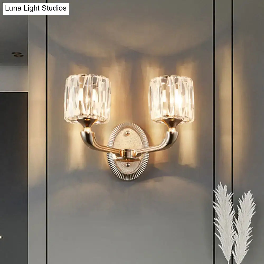 Elegant contemporary gold wall lamp with brass frame and two crystal shades suitable for led incandescent fluorescent light type