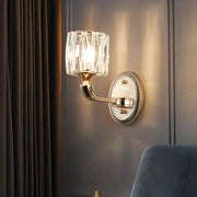 Elegant contemporary gold crystal wall lamp with ridged oval backplate and gold-toned metal base light type options include led incandescent fluorescent