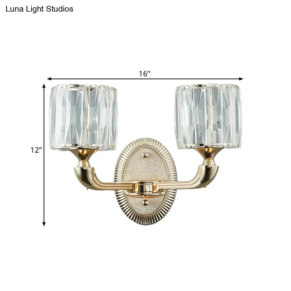 Contemporary gold wall lamp with two clear faceted crystal shades suitable for led incandescent fluorescent light type