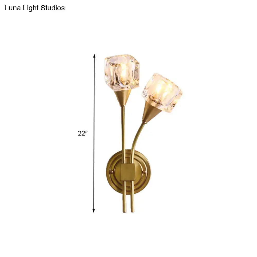 Brass-finished contemporary gold cube wall sconce with two clear crystal faceted shades for 110v-120v use