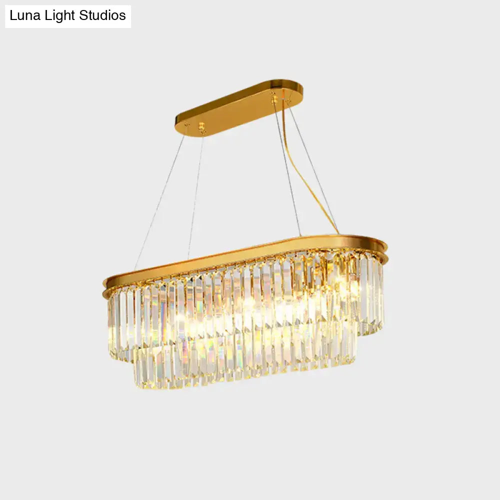 Contemporary gold finish ellipse island lighting chandelier with cascading clear crystal prisms for dining room
