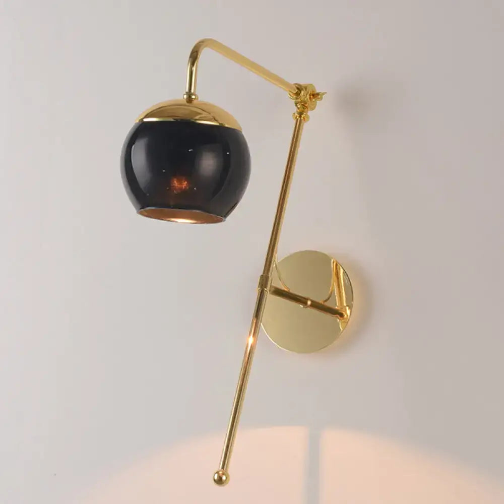 Contemporary gold gooseneck sconce light with black clear spherical glass shade wall mount lamp for bedroom