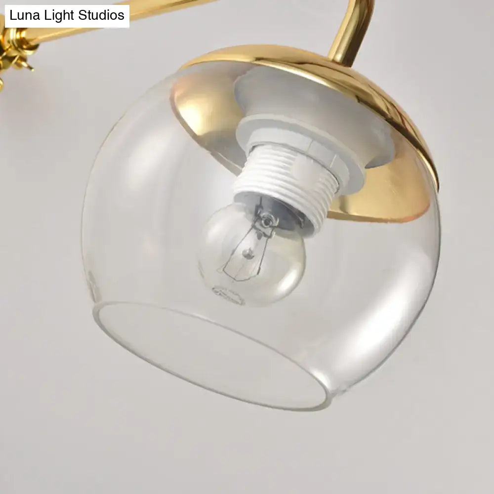 Contemporary gold gooseneck sconce light with spherical glass shade black clear bulb and white ceramic base wall mount lamp