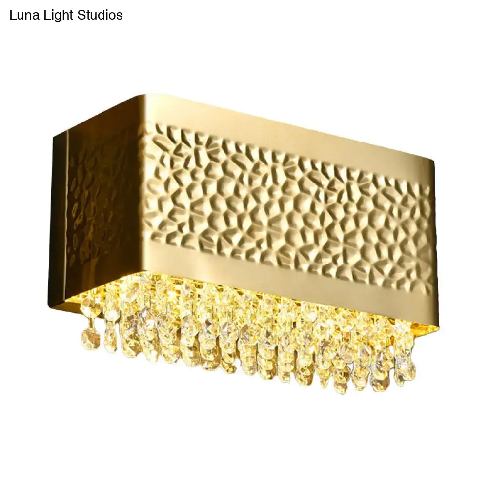 Contemporary gold hammered rectangle sconce light with textured metal frame and crystal accents for wall mounted lighting