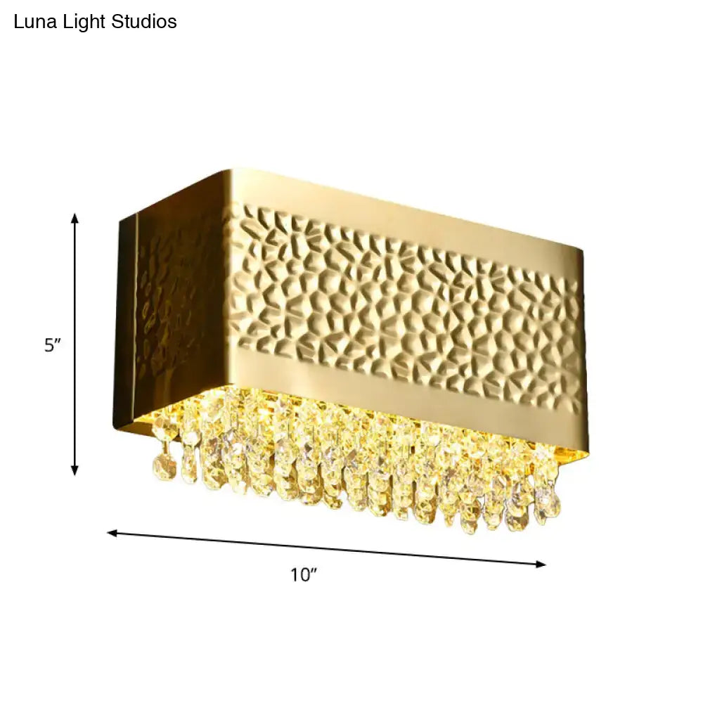 Contemporary gold hammered rectangle sconce light with textured metal face and dangling crystal beads for wall mounted lighting