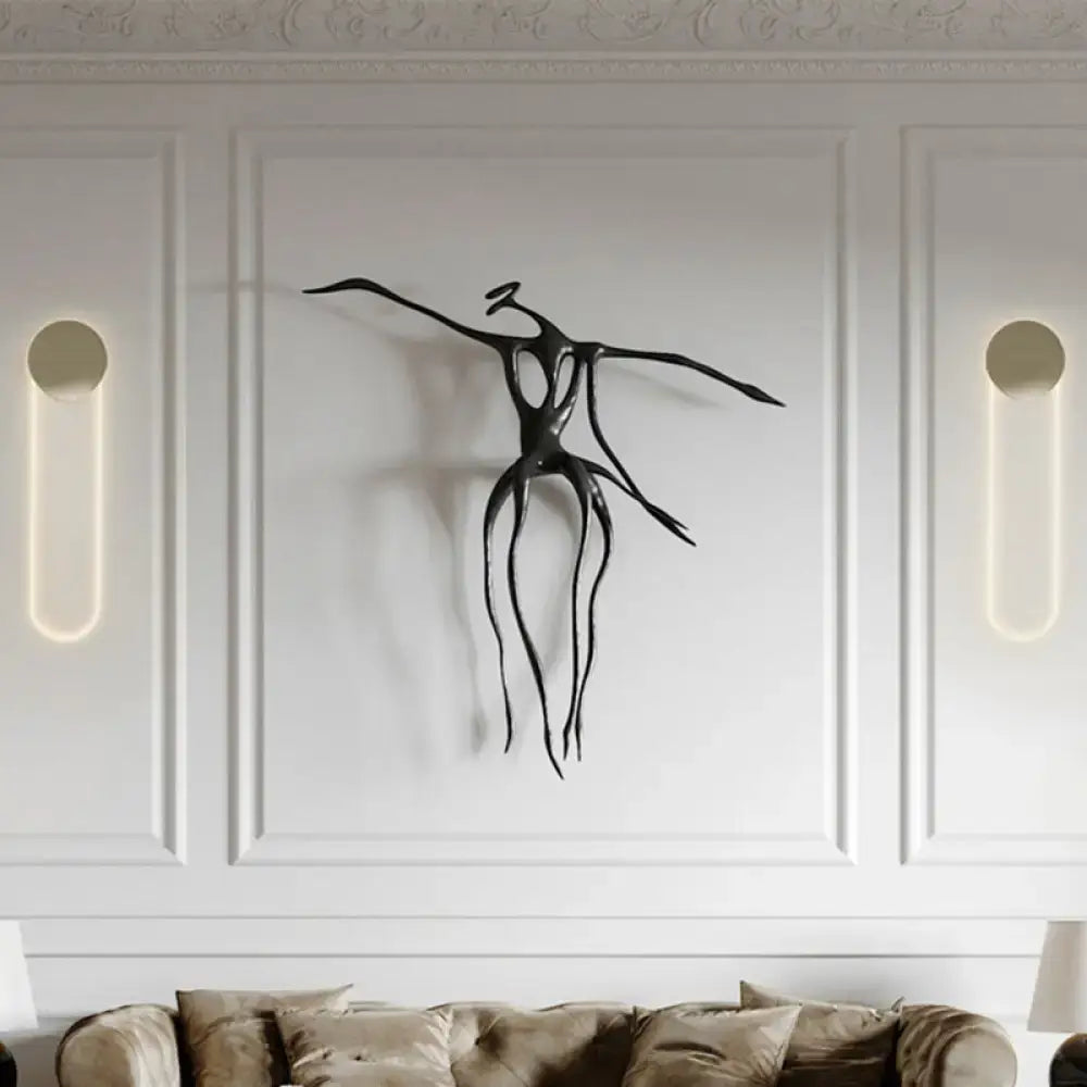 Contemporary black metal wall light sculpture with abstract elongated figure for 110v 120v light fixture use