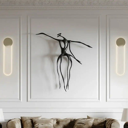 Contemporary black metal wall light sculpture with abstract elongated figure for 110v 120v light fixture use