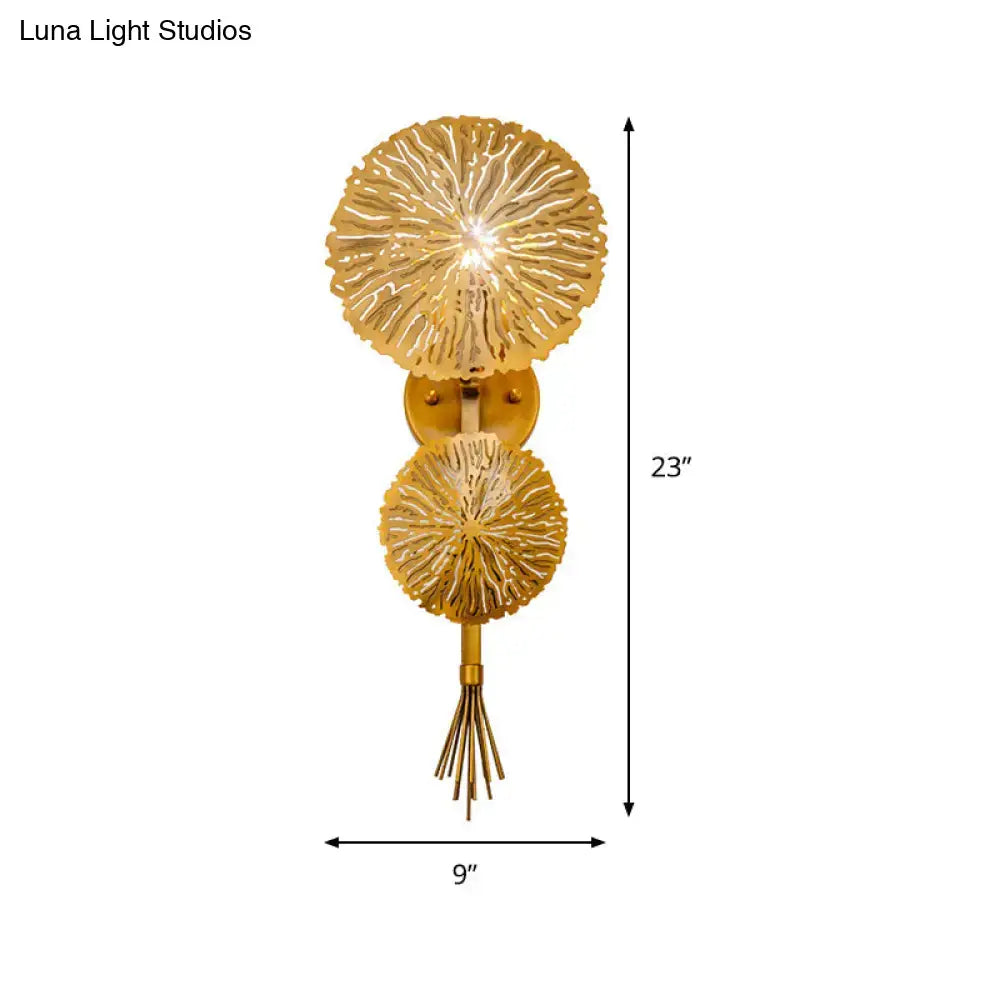 Contemporary gold-toned wall light with two textured glass shades and decorative tassel compatible with e14 bulb