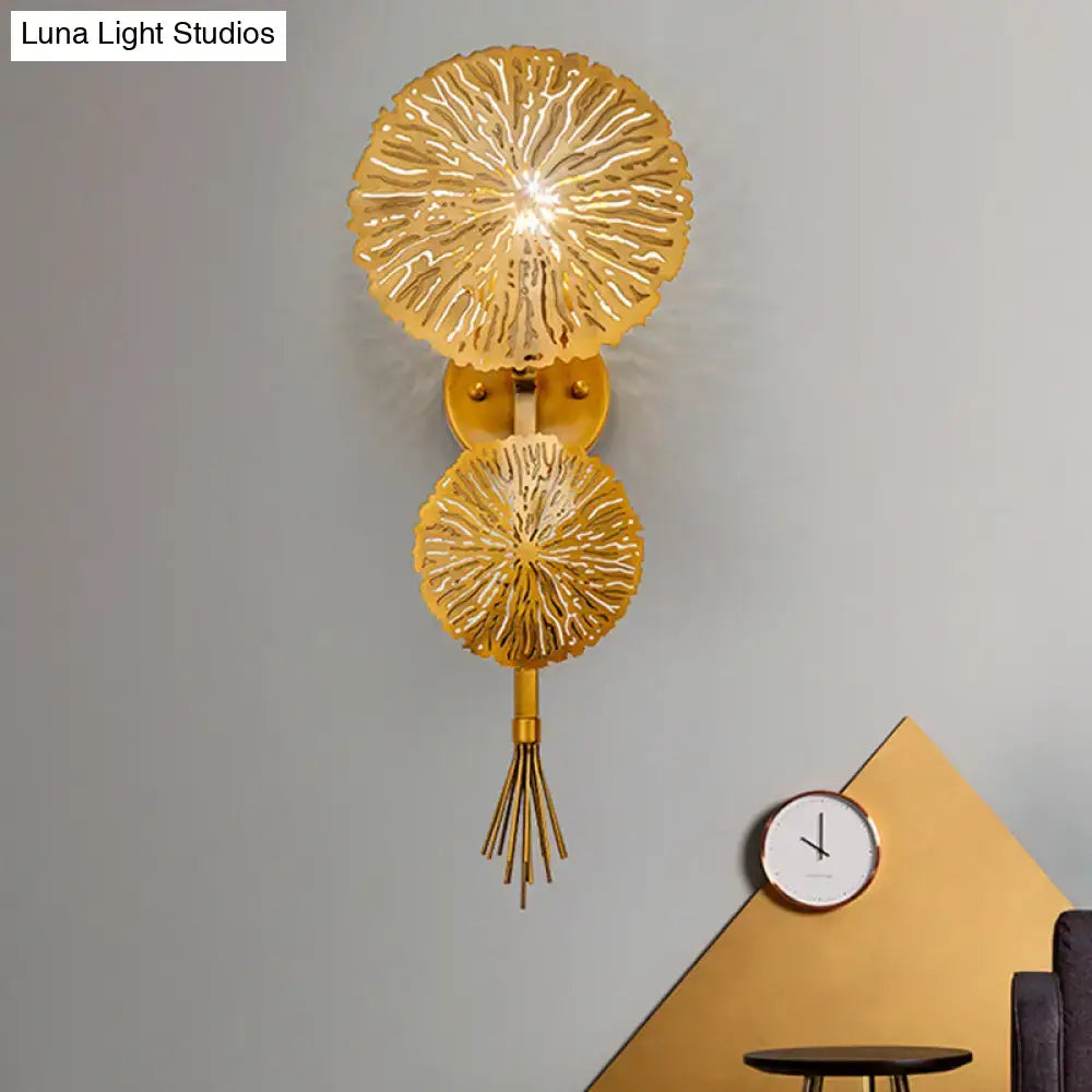 Contemporary gold wall light with layered petal discs and tassel compatible with e14 bulb for living room use