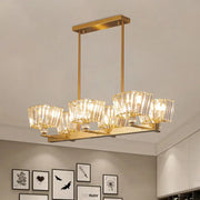DecorBites™ contemporary gold-toned ceiling light with six bulbs and faceted crystal trapezoid shades for dining rooms