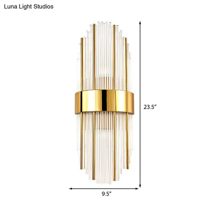 Contemporary gold wall light with clear crystal shade featuring gold-toned brass and radiating clear glass rods for living room