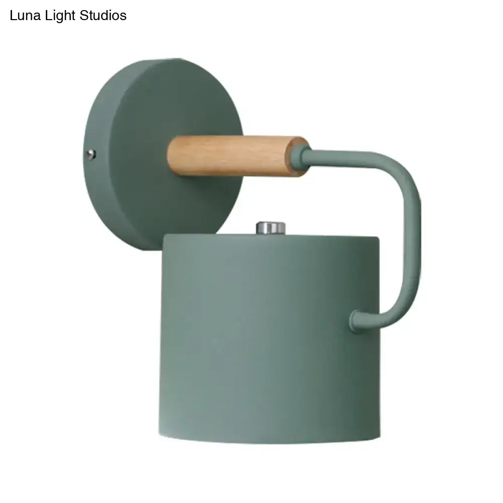 Contemporary gray metal wall light with sage green sconce, wooden accent, and curved arm for 110v-120v and 220v-240v use