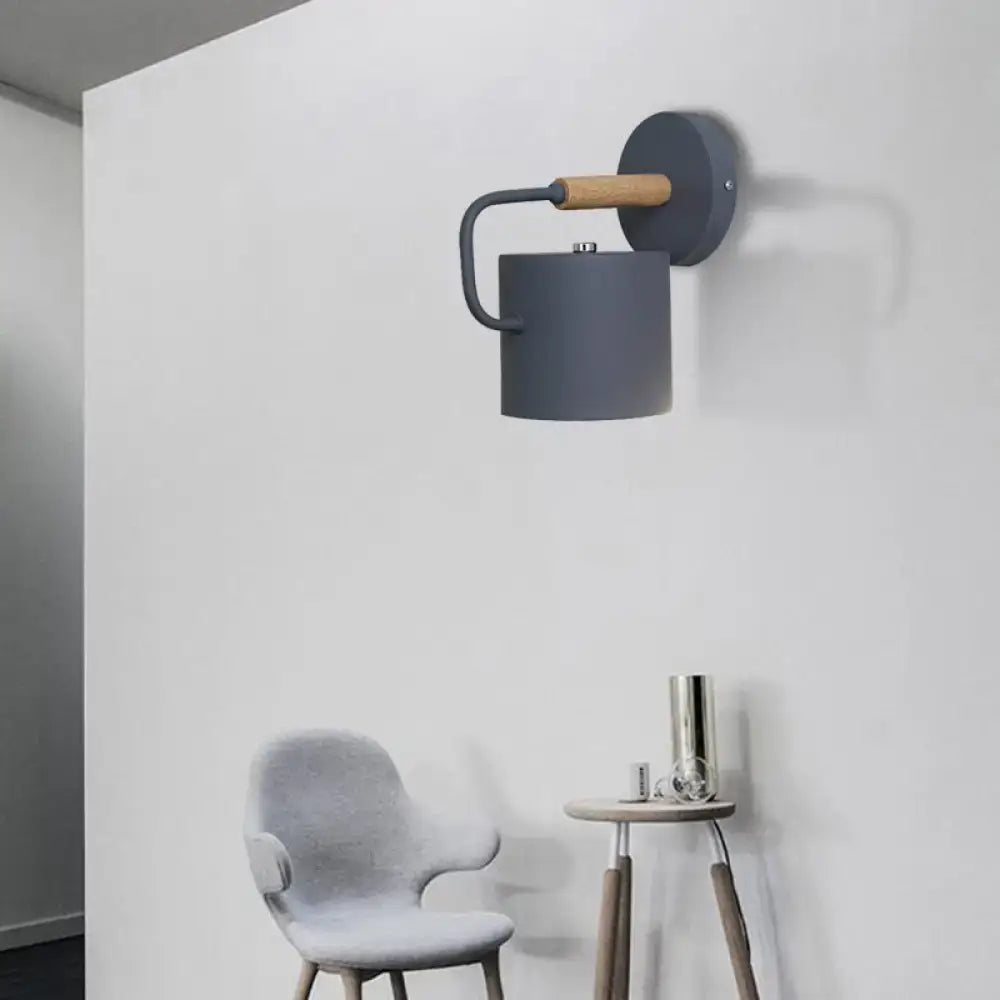 Contemporary gray metal wall light with cylindrical shade and wooden handle for 110v-120v or 220v-240v bedroom use