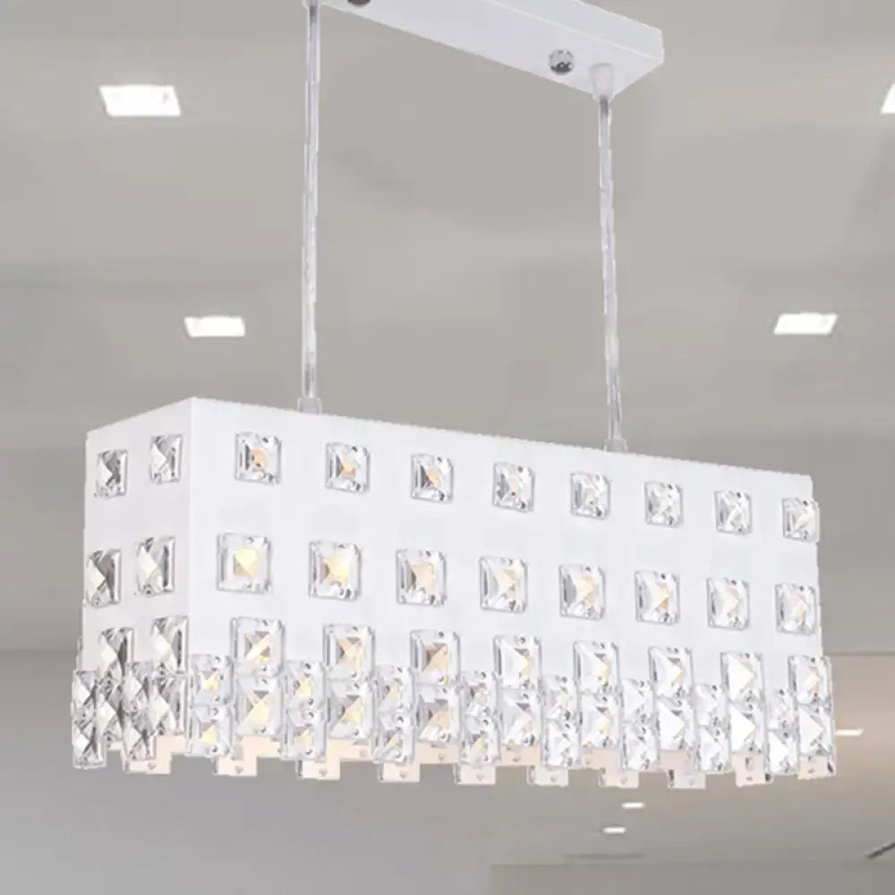 Contemporary ivory metal chandelier with white rectangular frame and clear crystal accents for dining room lighting