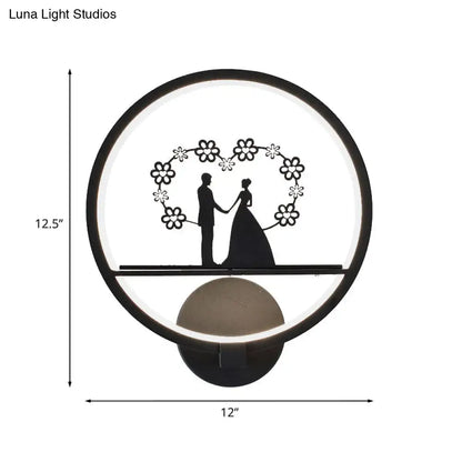 Contemporary lover black circular led wall sconce with floral wreath silhouette design direct wired electric for bedroom