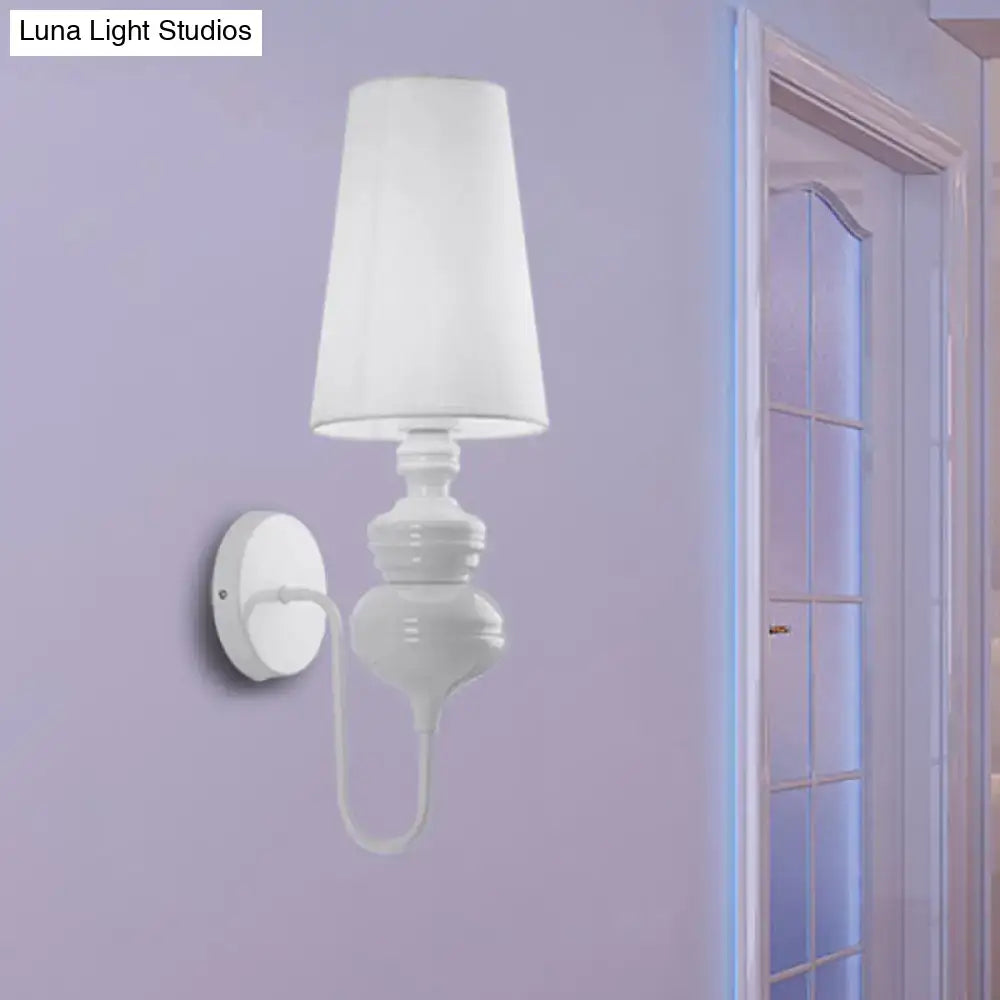 White ceramic wall mount light with tapered fabric shade for contemporary bedroom lighting fixtures