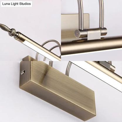 Contemporary nickel finish led wall sconce with brass finish adjustable arm and warm light for bedroom use