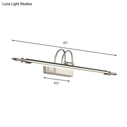 Contemporary 22-inch wall-mounted vanity light with nickel finish, sleek rectangular fixture, curved arms, and warm white light
