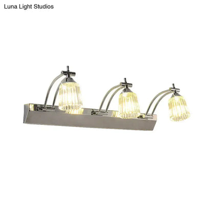 Contemporary silver 3 head crystal vanity light wall light with curved chrome arms and warm white faceted glass shades