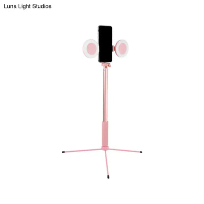 Contemporary style pink selfie stick with two circular led lights and usb port compatible with 110v-120v and 220v-240v