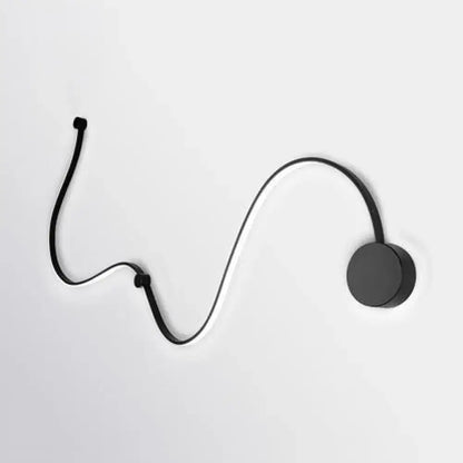 Contemporary twist black wall sconce with sleek curved design and circular base for white warm bedroom lighting