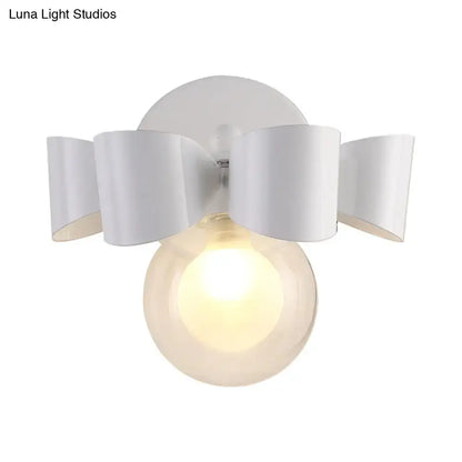 Contemporary white ceramic petal wall lamp with white metal bow-shaped sconce and frosted glass round wall bulb